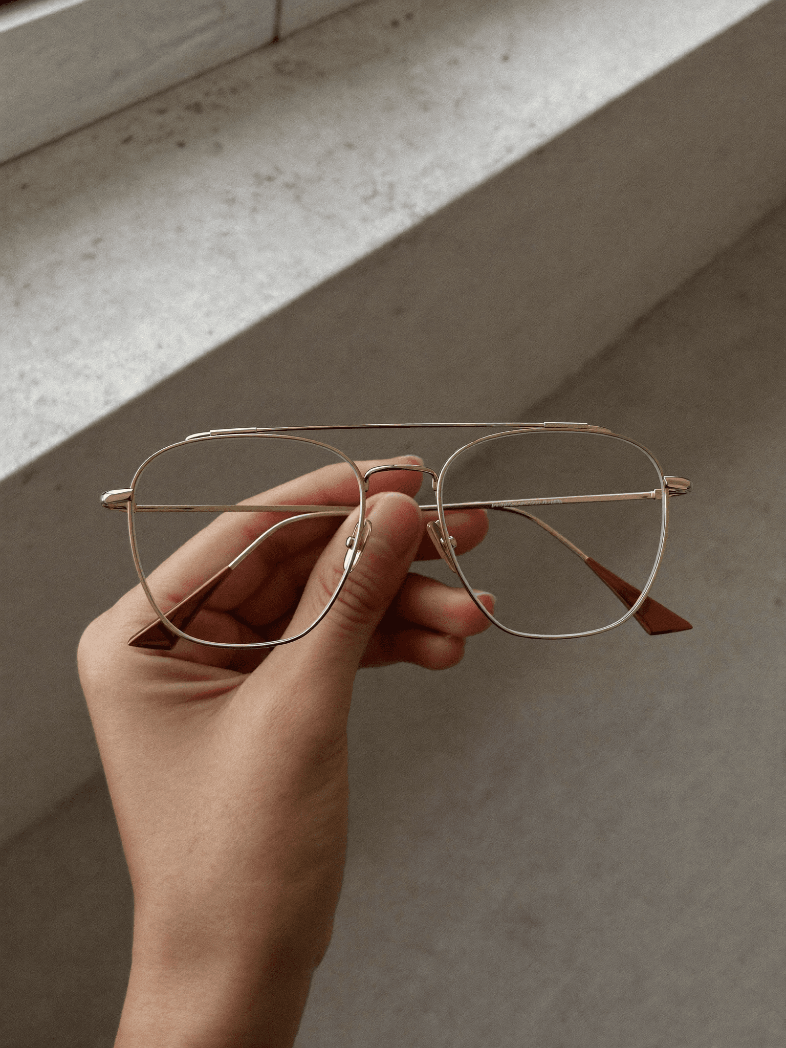 Elegant gold rimless eyeglasses detail